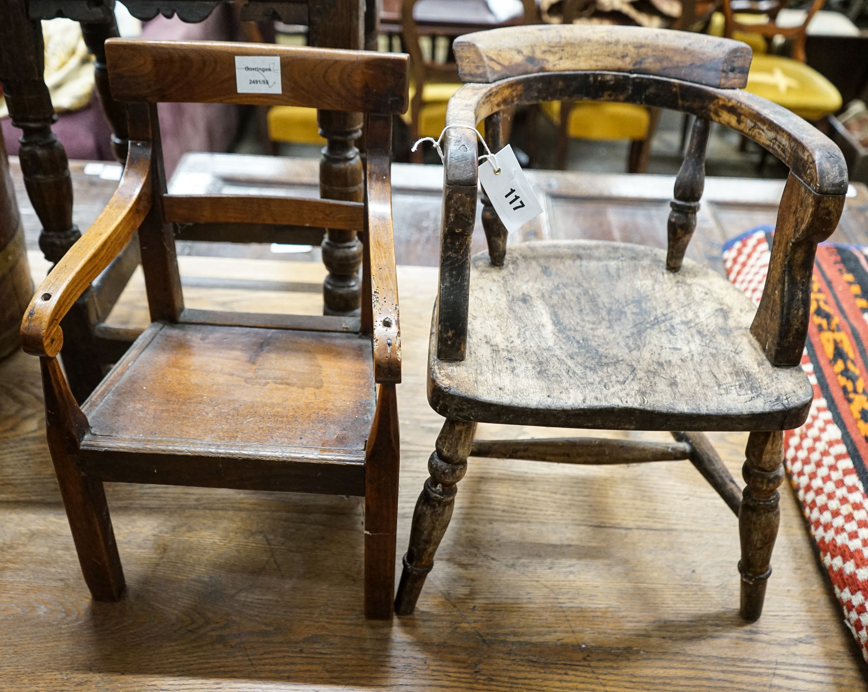 A 19th century fruitwood child's chair, delete width 30cm, height 48cm and a child's primitive tub chair